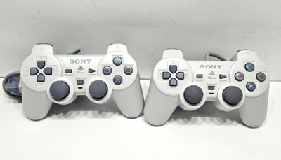 PS1 - 2kpl PSone Dualshock ohjaimia