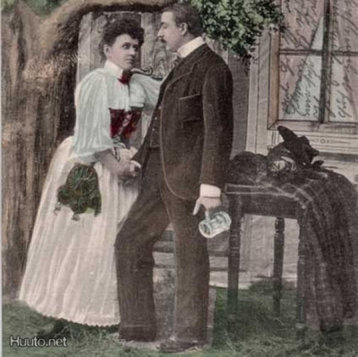 RAKKAUS / Nainen ja mies rakastuneina puutarhassa. 1900-l.