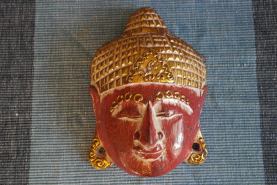 Buddha maski.Seinäkoriste