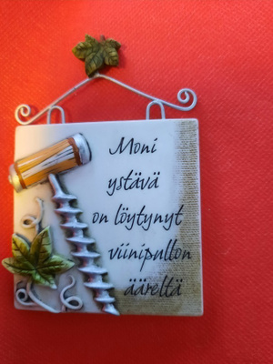 Jääkaappimagneetti tekstillä