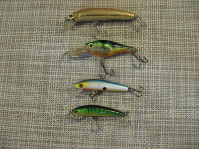 Vaappuja Conrad,Rapala,Abu Tormentor Cardia ja yksi muu.