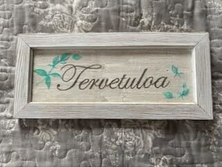 Tervetuloa-kyltti