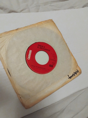 Sheila & B. Devotion - Singing in The Rain 7'' vinyylisinkku