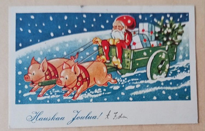 Joulupukki ajaa kahdella porsaalla, kyydissä lahjat 1935?