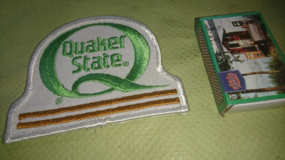 Quaker State kangasmerkki