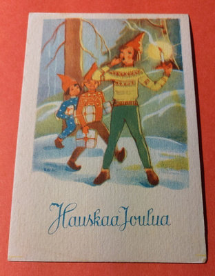 Lapset tonttuhattujen kanssa