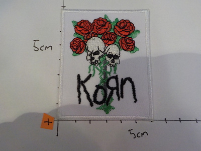 KORN UUSI HIHAMERKKI (+)