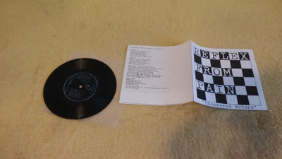 REFLEX FROM PAIN - Checkered Future FLEXI 7"