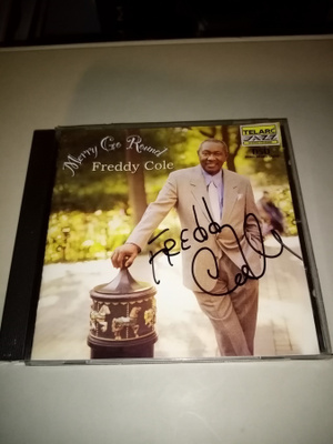 CD FREDDY COLE : MERRY GO ROUND ( SIGNED)