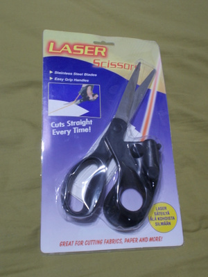 Sakset laservalokohdistuksella