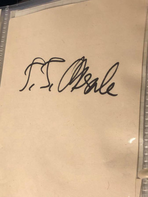 T.T. Oksalan nimikirjoitus paperilla