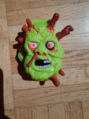 Mighty max horror heads Ax man