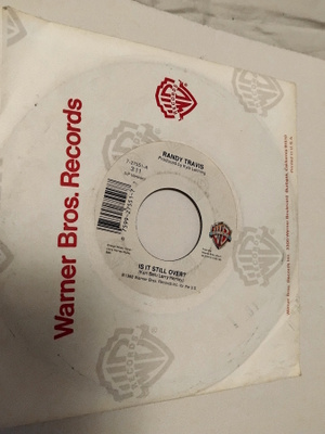 Randy Travis - Is It Still Over  7'' vinyylisinkku