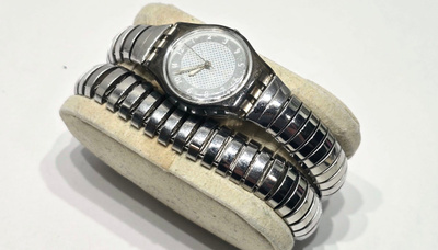 Swatch Winding Flex rannekello [36]