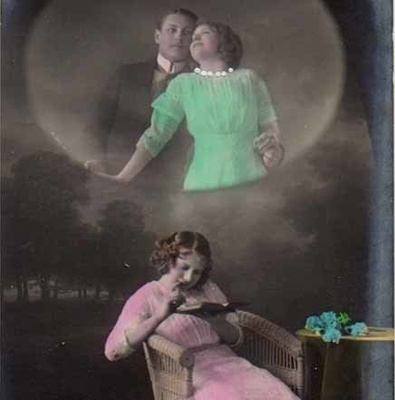 NAINEN / Rakastunut tyttö lukee kirjaa. 1930-l.