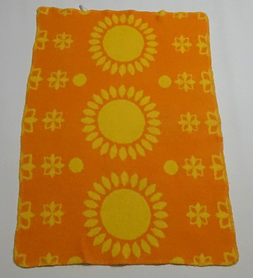 Retro 70-luvun aurinkoviltti äitiyspakkauksesta