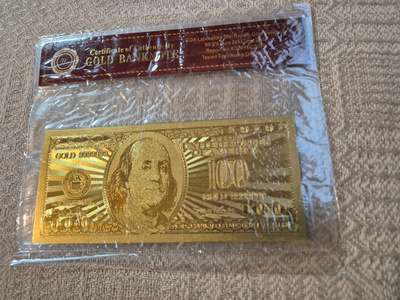 Kullattu 100 USD seteli