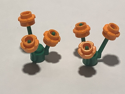 Lego kukkavarret ja oranssit kukat