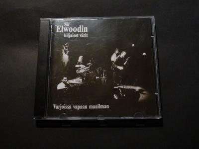 SIR ELWOODIN HILJAISET VÄRIT Varjoissa Vapaan Maailman CD.