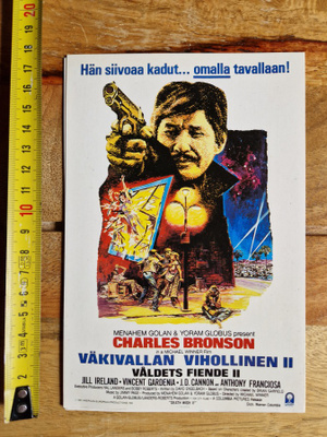 Väkivalla Vihollinen 2 Videovuokraamon mainospostikortti