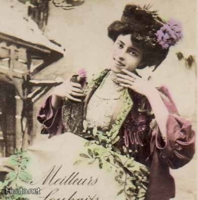 NAINEN / Pillerihattuinen tyttö ja luminen maisema. 1900-l.
