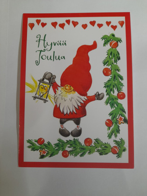 Joulupukki lyhdyn kanssa