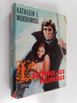 Kathleen E. Woodiwiss : Liekki ja kukka