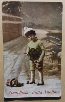 Lapsi tuo neliapilaa, hevosenkengän, kukkia, Uusi Vuosi, k.