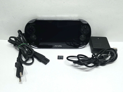PSVITA konsoli + 2 peliä + 4GB muistikortti