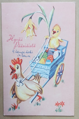 Kanamamma vetää tipua kärreillä, joissa munia ja kukkia 1968