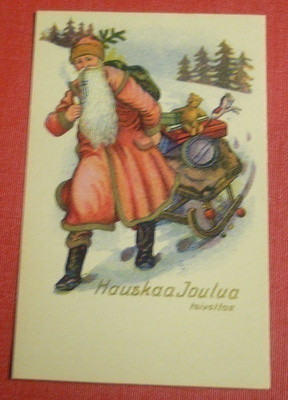Joulupukki vetää lahjat pulkalla (K11)