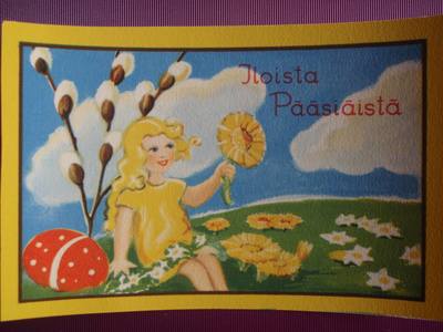 Etel Raivio tytöllä leskenlehti kädessä 2.
