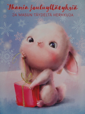 Pupu paketoi lahjaa