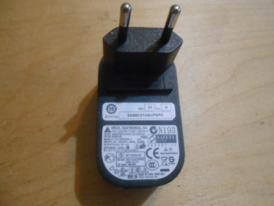 Delta Electronics AC/DC Adapter, laturi.
