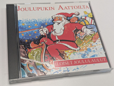 Joulupukin Aattoilta - Iloiset Joululaulut (CD) HIENO KUNTO!