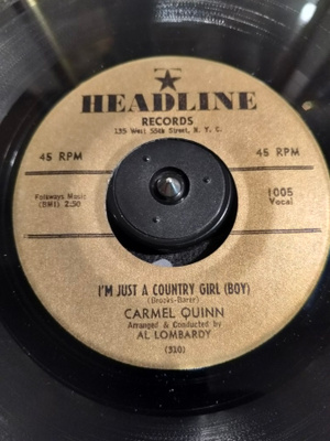 CARMELL QUINN,HEADLINE 1005