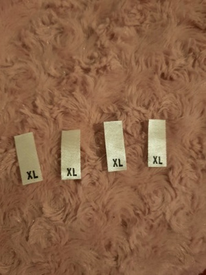 XL Kokomerkki