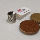 Kalevala Koru, My SAAGA -kirjainhela Q, Hopea 925 kk - pikkukuva 3
