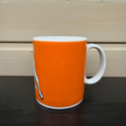 Marimekko Kevätjuhla lehmämuki 25cl, oranssi - pikkukuva 2