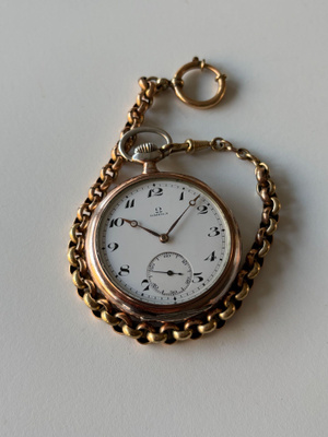 1915. v. Omega taskukello hopeakuorilla ja dupleeperät