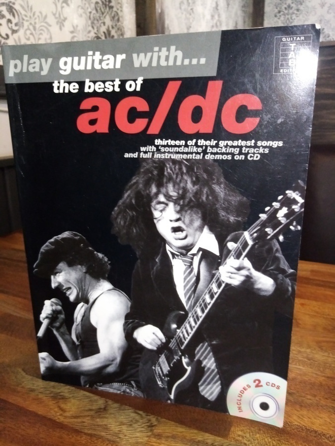 Nuottikirja AC/DC THE BEST OF PLAY guitar with...