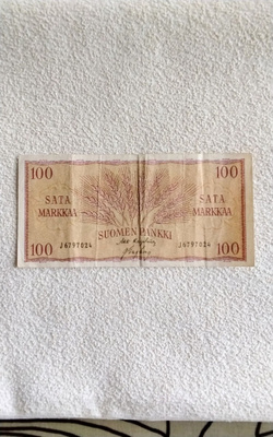 100 markan seteli 1957 vuodelta kuvan mukainen