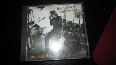 Huey Lewis And The News* – Hard At Play