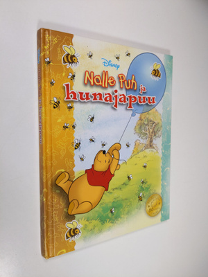 Nalle Puh ja hunajapuu : herttainen tarina Puolen hehtaar...