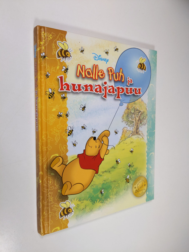 Nalle Puh ja hunajapuu : herttainen tarina Puolen hehtaar...