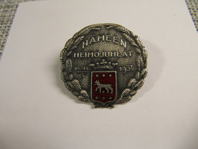Hämeen Heimojuhlat 16.-17.6. 1934 rintamerkki.