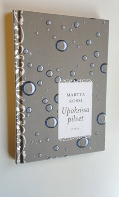 Martta Rossi : Upoksissa pilvet