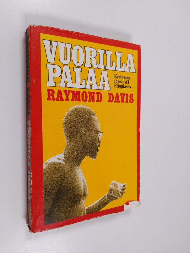 Raymond J. Davis : Vuorilla palaa : kertomus ihmeestä Eti...