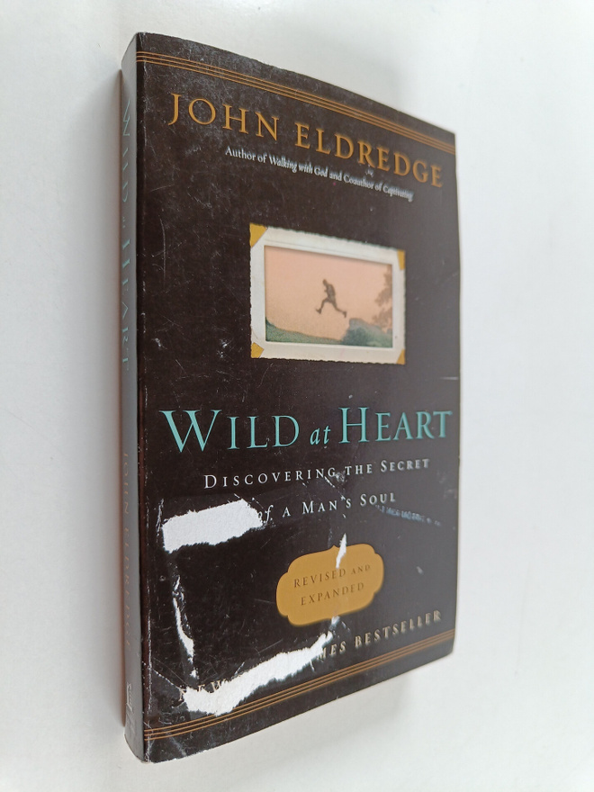 John Eldredge : Wild at Heart : Discovering the Secret of...