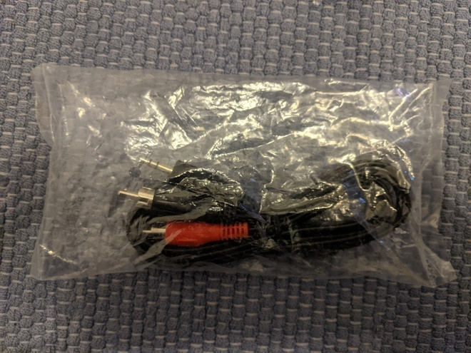 Stereo audio kaapeli ca. 1.2m (2x cinch - 3.5 mm jack uros)